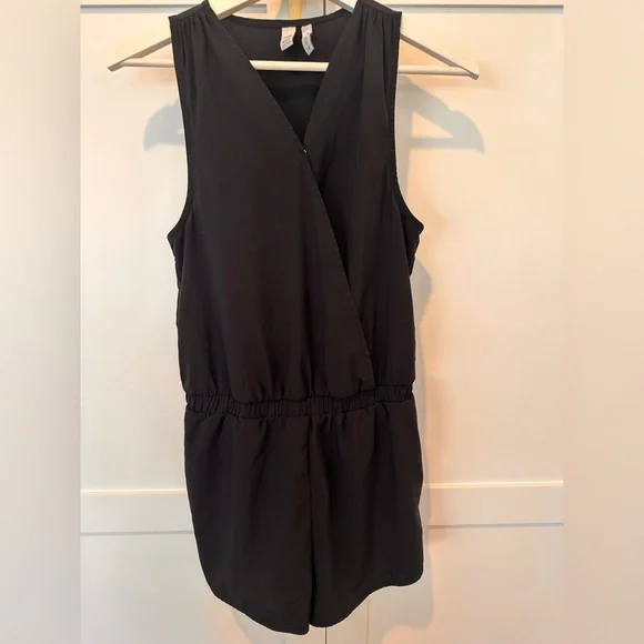 Zella Black Sleeveless Romper - Picture 1 of 4